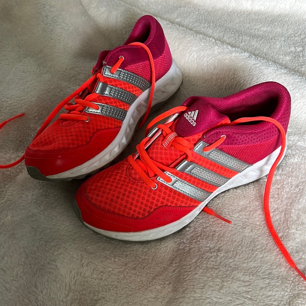 Adidas running shoes, size 6.5. Bright orange and fuscia with silver stripes.